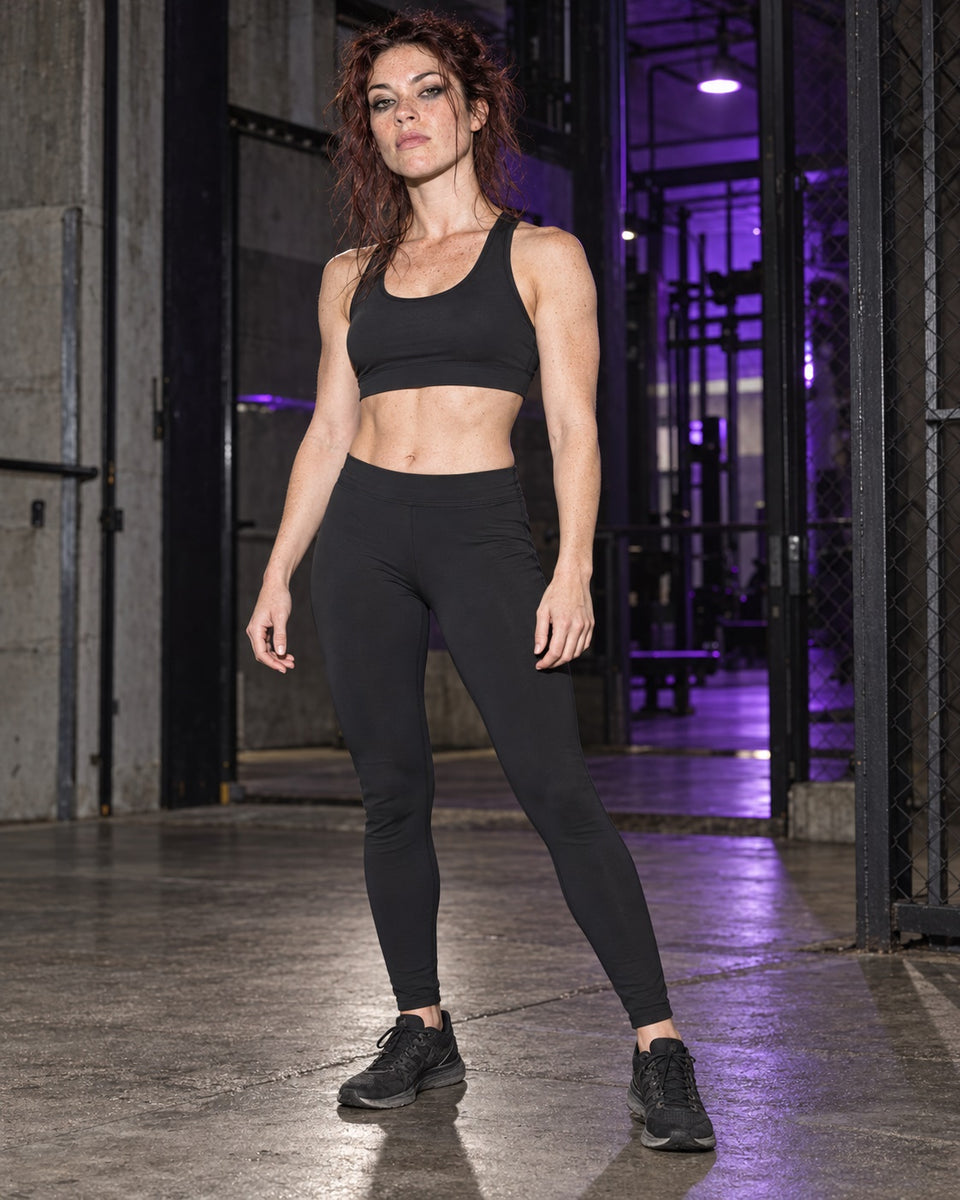 Solid Black Leggings, worn on model with the Solid Black Sports Bra