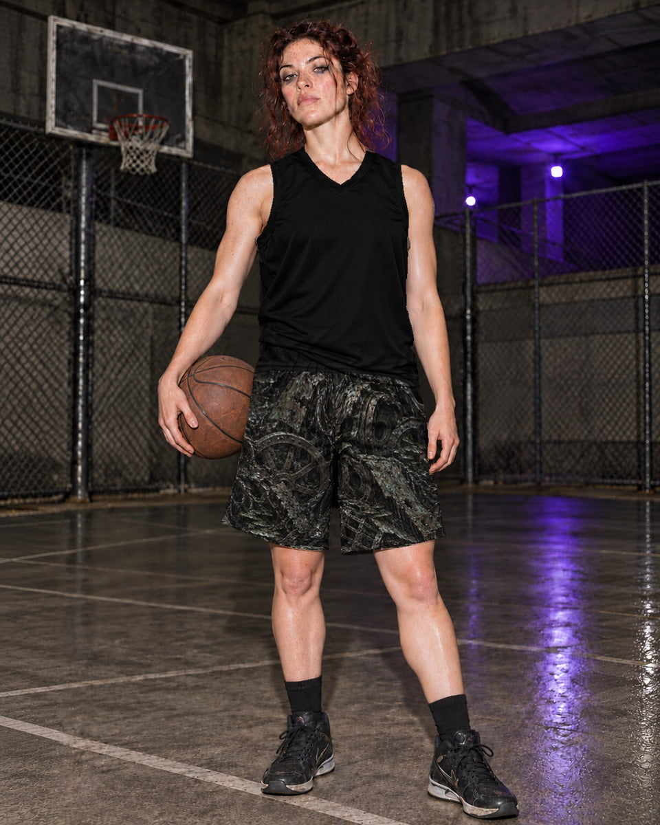 Solid Black Basketball Jersey, worn on model with the Rot and Iron Terrain Athletic Shorts