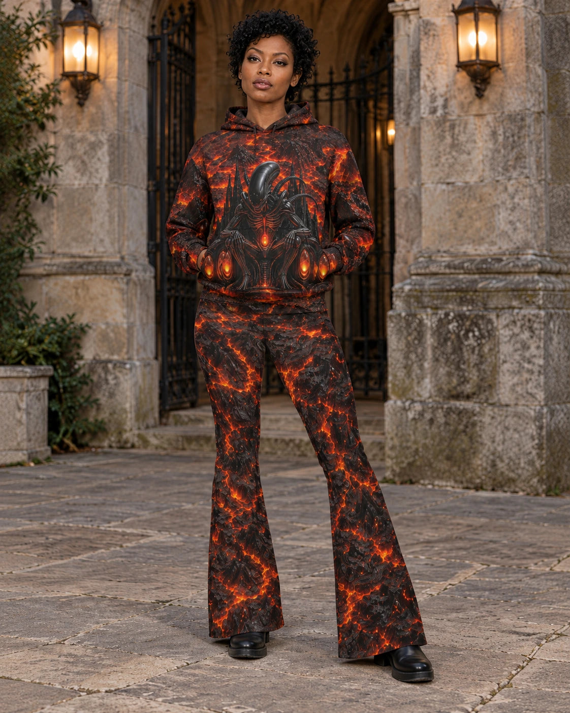 Matching outfit: Full-length model wearing Cinder Throne flare leggings styled with Cinder Throne Dominion Hoodie.