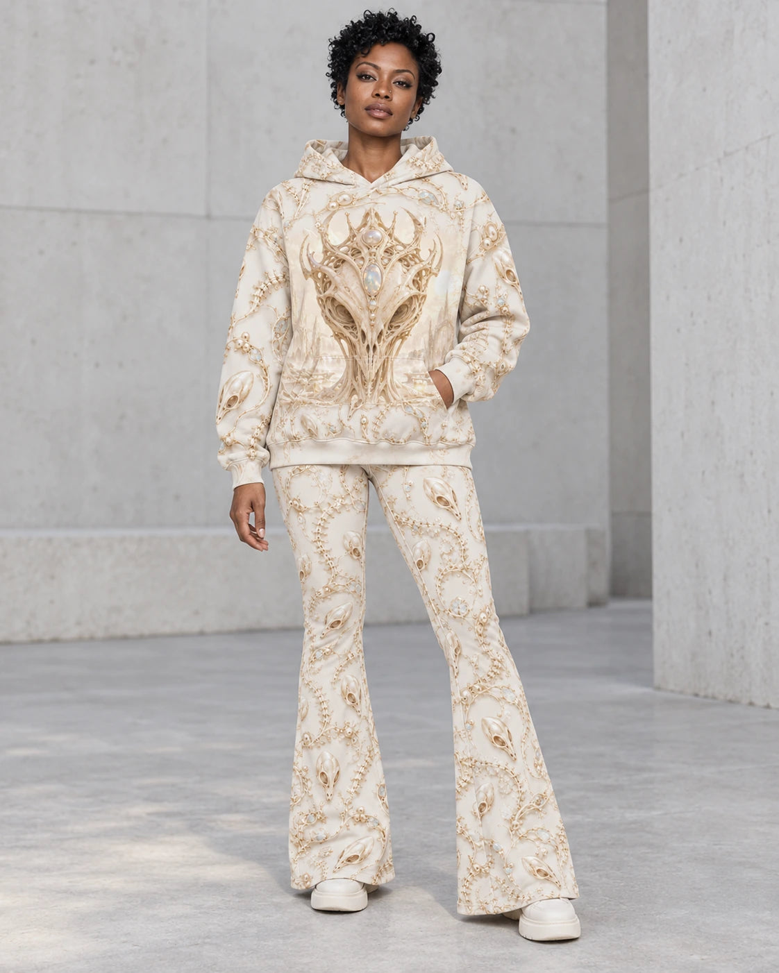 Matching outfit: Full-length model wearing Ivory Alien Skulls flare leggings styled with Ivory Alien Skulls Hoodie.