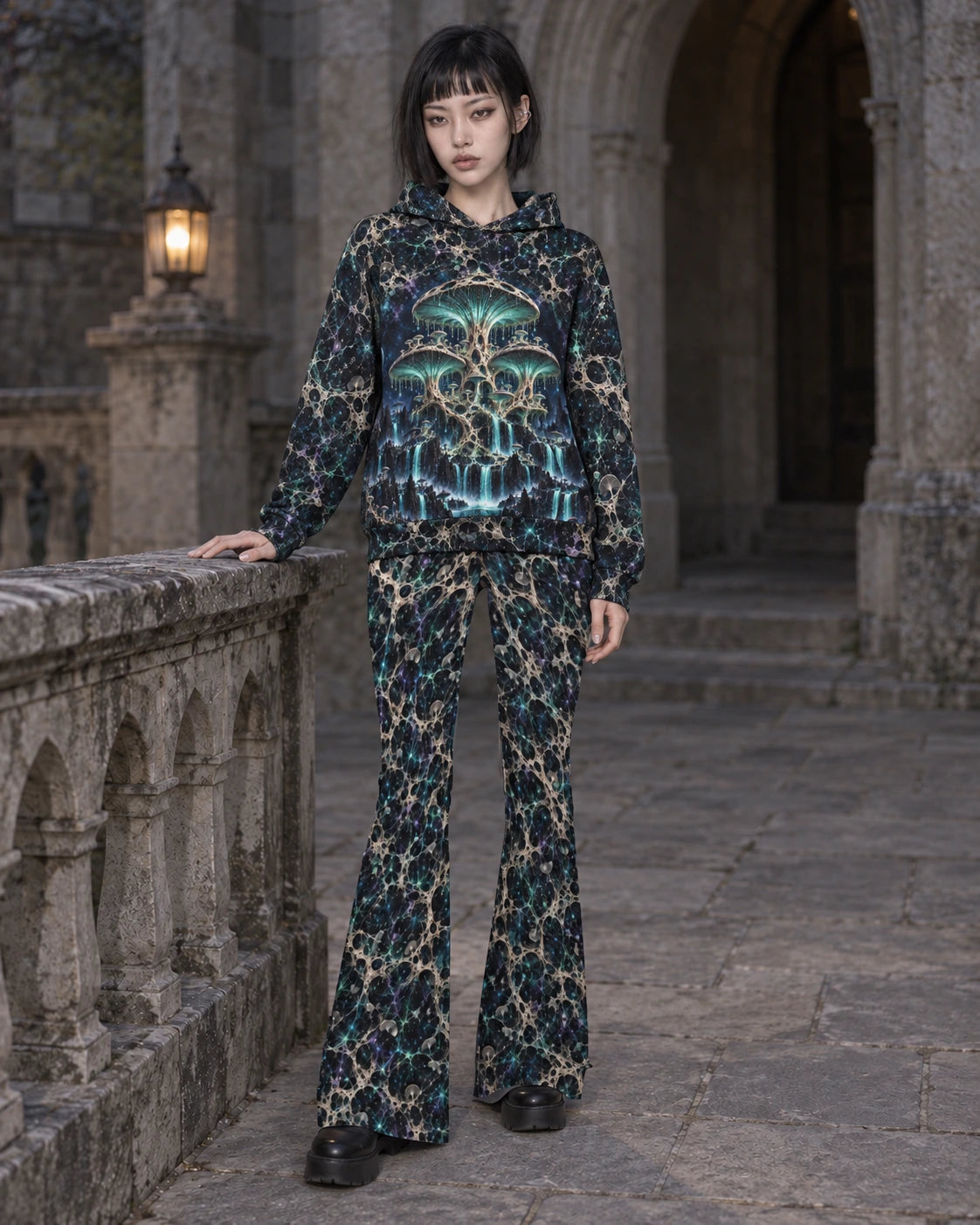 Matching outfit: Full-length model wearing Mycelium Cathedral Web flare leggings styled with Mycelium Cathedral Hoodie.